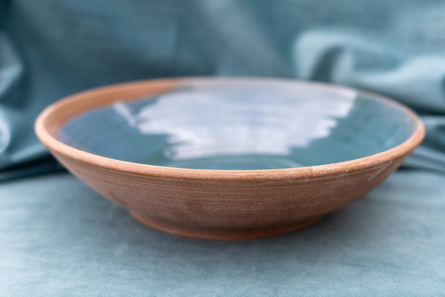 Serving bowl - large - blue - red stoneware - floral centre