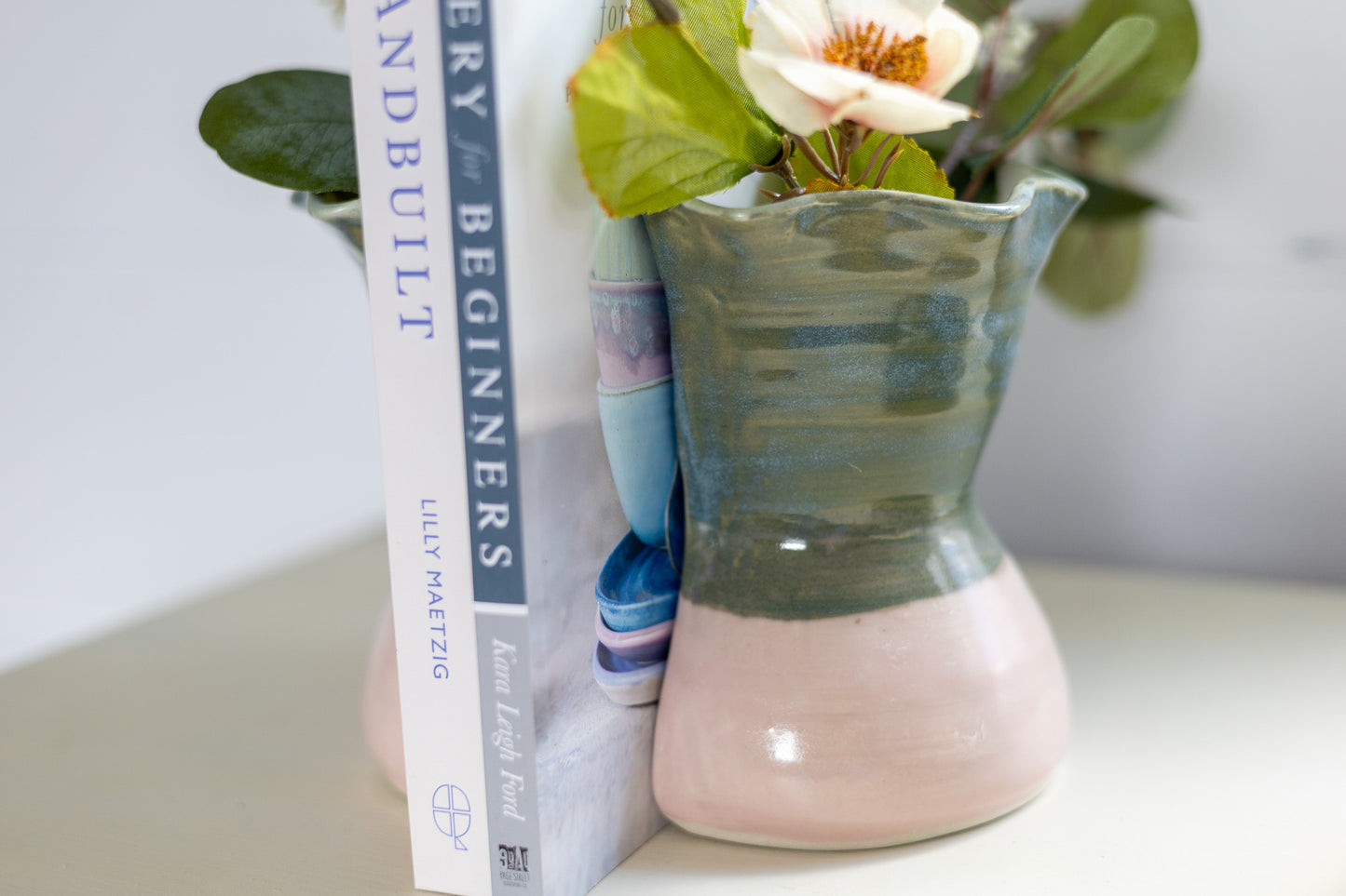 Duotone vase bookends - large - green-blue/pink