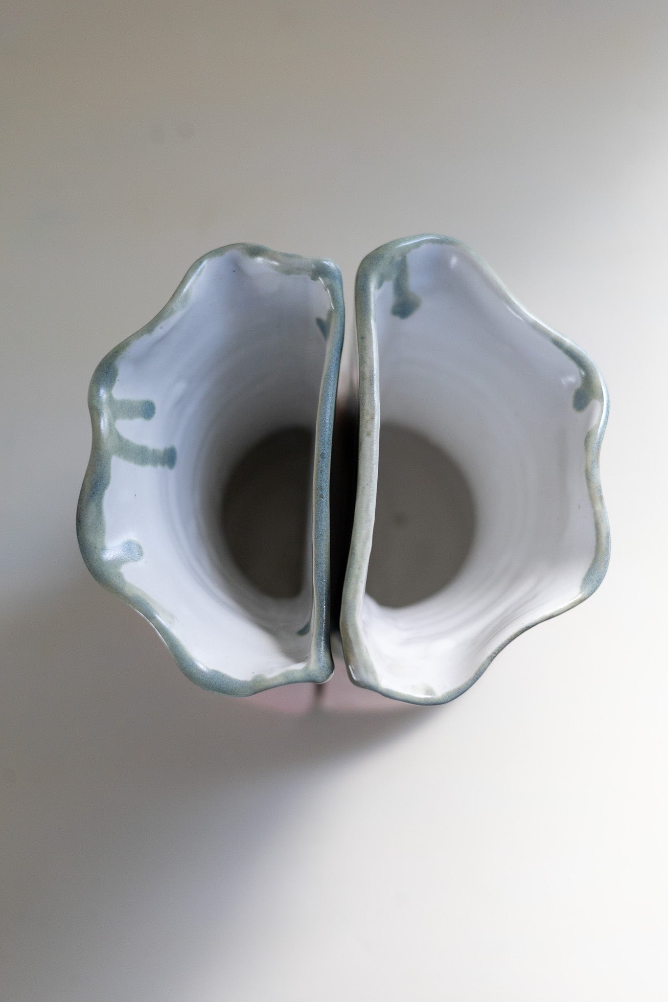 Duotone vase bookends - large - green-blue/pink